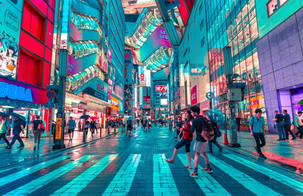 people walking on road near well-lit buildings (foodtech startups)