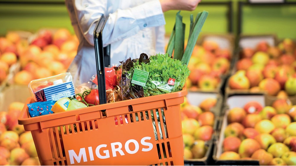 migros basket in front of fruits